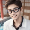 水泳用ゴーグルをかけてプールサイドで微笑む若い男性のポートレート。 / A portrait of a young man smiling by the pool while wearing swim goggles.