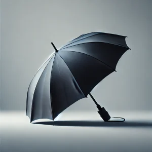 光沢のある生地が印象的な、開いた状態の折りたたみ傘
A compact umbrella in the open position with a sleek, glossy canopy