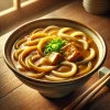 濃厚なカレー出汁にやわらかいうどんが絡む一杯、青ねぎと角煮が食欲をそそる Thick curry broth coating soft udon noodles, topped with green onions and tender pork cubes