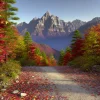 紅葉に染まる山道の先に切り立った岩峰がそびえる秋の絶景 A stunning autumn view with a rocky peak rising beyond a mountain path covered in vibrant foliage